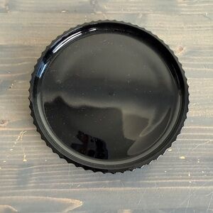 LE Smith vintage black glass table wear
Round dish 6” x .75”